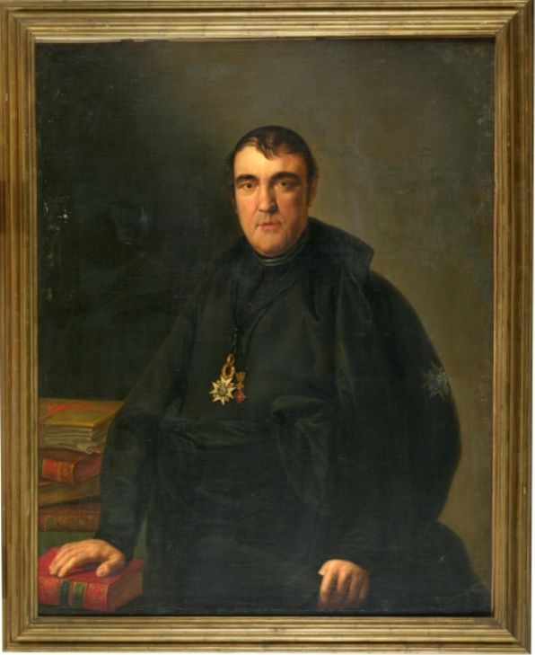 Francisco Antonio González Oña Retrato pictórico de Francisco Antonio González Oña, vestido con hábito oscuro, junto a una mesa con libros