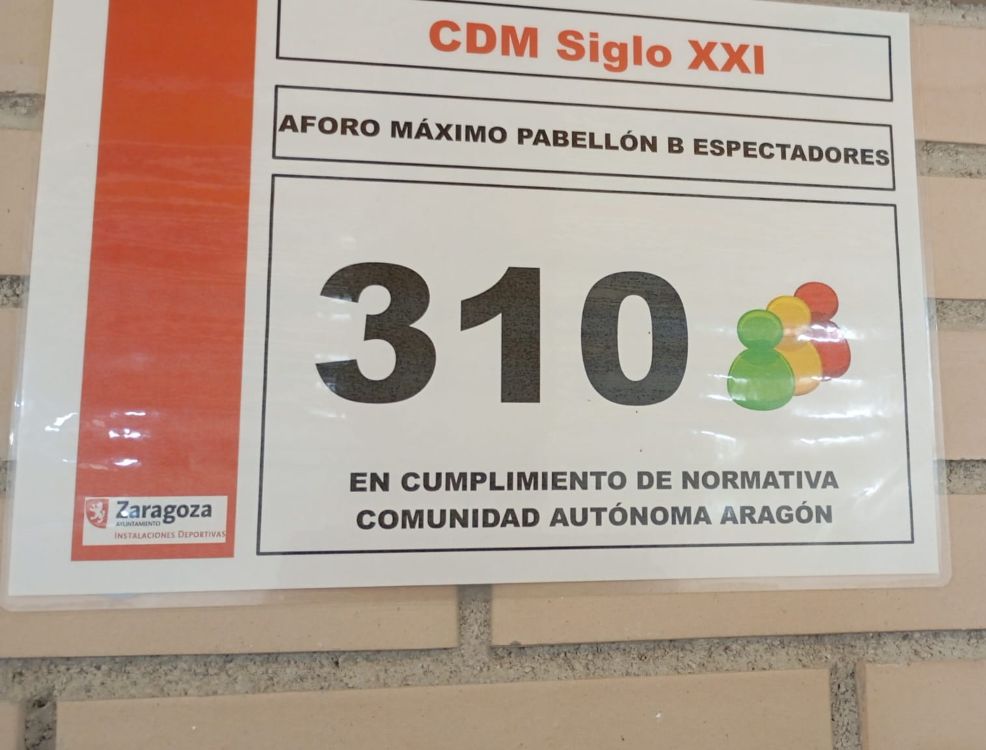 Nuevo aforo máximo Cartel institucional con el texto 'Aforo máximo pabellón B espectadores 310', acompañado del logotipo del Ayuntamiento de Zaragoza y gráficos circulares en rojo, amarillo y verde