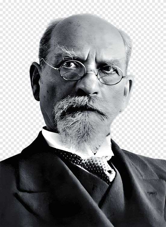 Fenomenología trascendental. Retrato en blanco y negro de Edmund Husserl, con gafas redondas, bigote y perilla blancos, vestido con traje formal